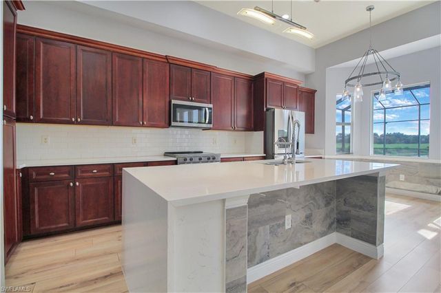 1696 Sarazen PL, Naples, FL 34120