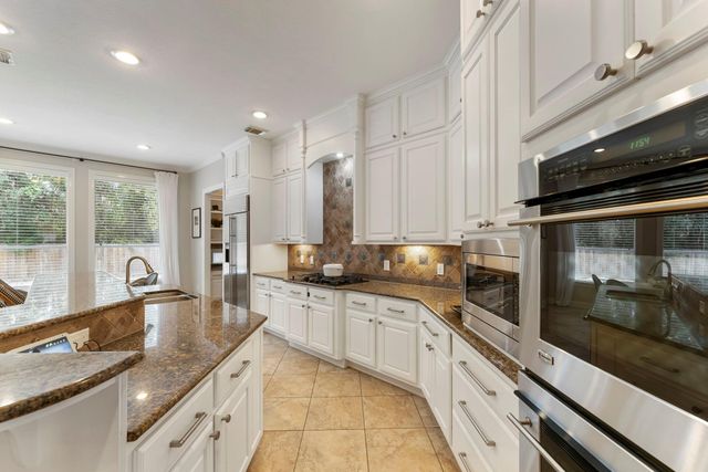 6 Lagato Place, Spring, TX 77382