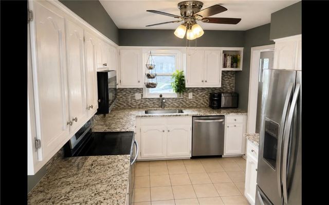 506 S Monroe Street, Raymore, MO 64083