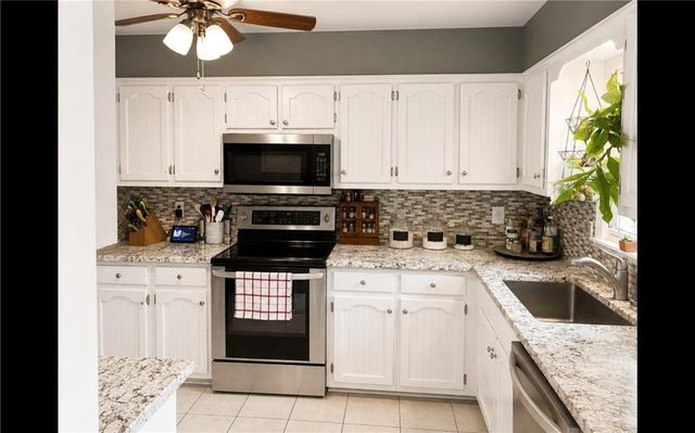 506 S Monroe Street, Raymore, MO 64083