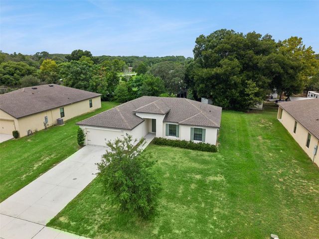 35669 ROSE MOSS AVENUE, Leesburg, FL 34788