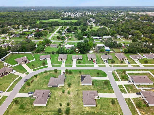 35669 ROSE MOSS AVENUE, Leesburg, FL 34788