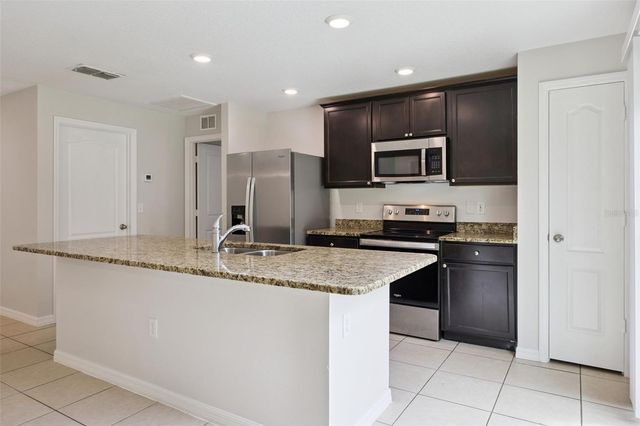 35669 ROSE MOSS AVENUE, Leesburg, FL 34788