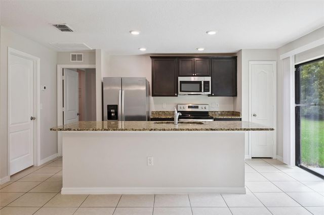 35669 ROSE MOSS AVENUE, Leesburg, FL 34788