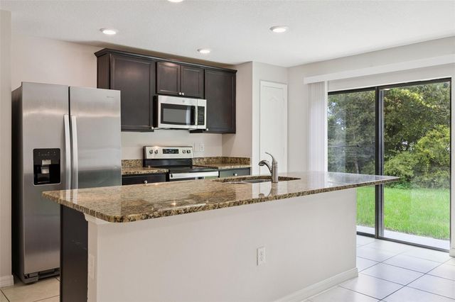 35669 ROSE MOSS AVENUE, Leesburg, FL 34788