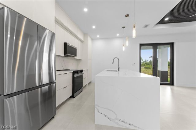 731 Colyer ST E, Lehigh Acres, FL 33974