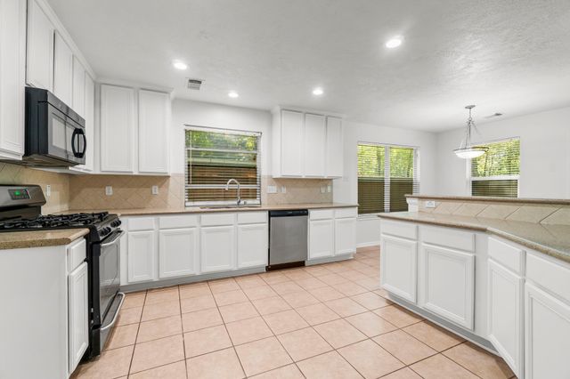 255 Genesee Ridge Court, Conroe, TX 77385