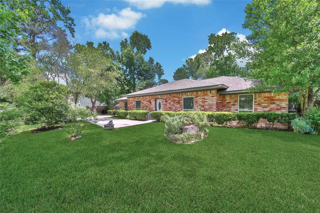 2668 S Woodloch Street, Woodloch, TX 77385