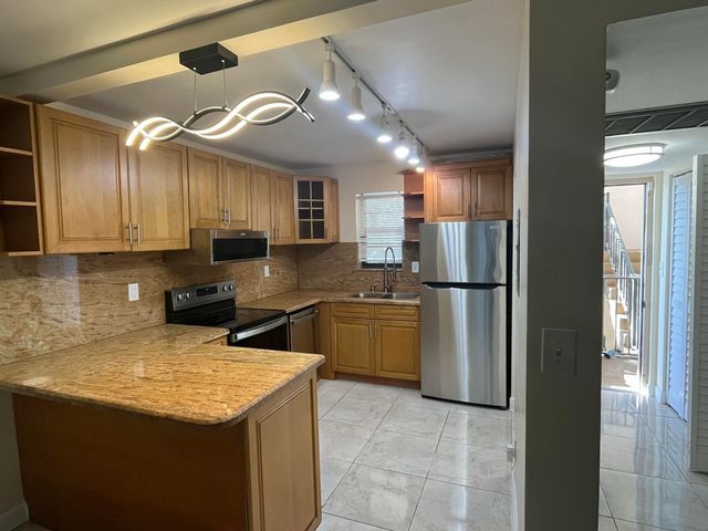 9300 SW 8th Street 301, Boca Raton, FL 33428