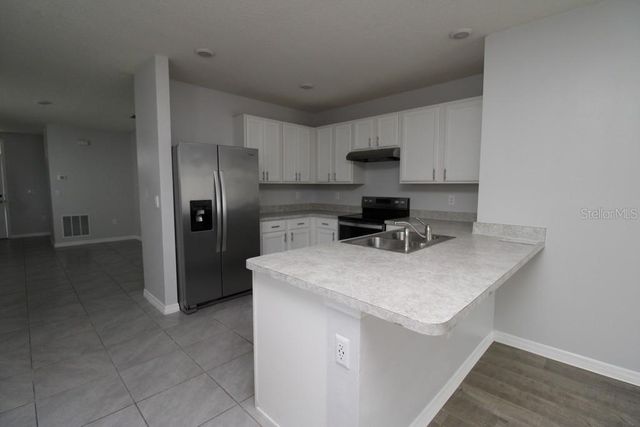 6745 HUNTLEIGH HAMMOCK ROAD, St Cloud, FL 34773