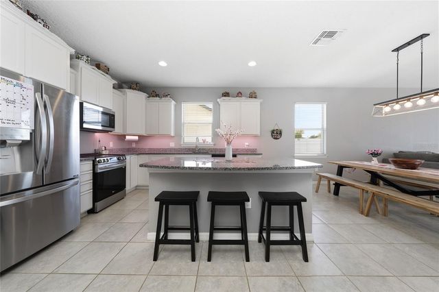 8746 CONOY AVENUE, Polk City, FL 33868