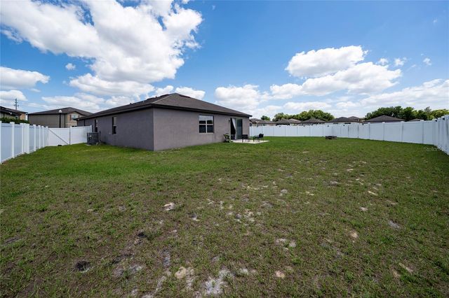 8746 CONOY AVENUE, Polk City, FL 33868