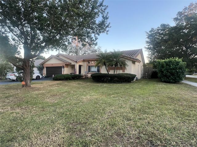 9876 NW 28th Court, Coral Springs, FL 33065