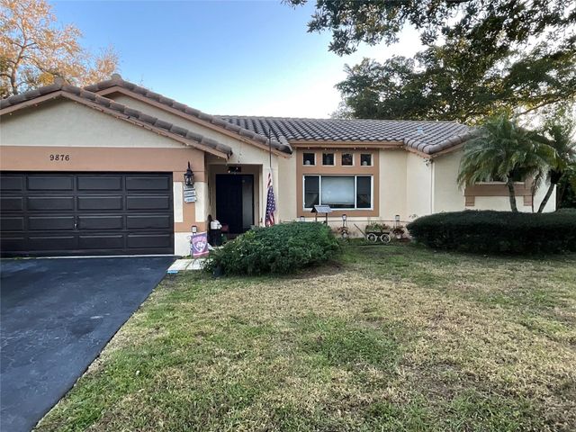 9876 NW 28th Court, Coral Springs, FL 33065