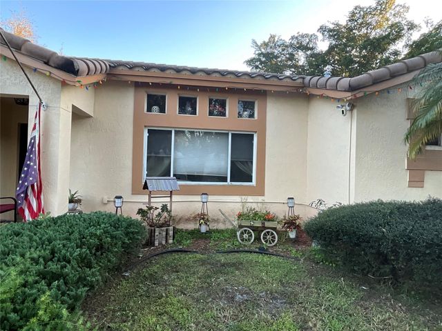 9876 NW 28th Court, Coral Springs, FL 33065