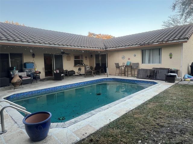 9876 NW 28th Court, Coral Springs, FL 33065