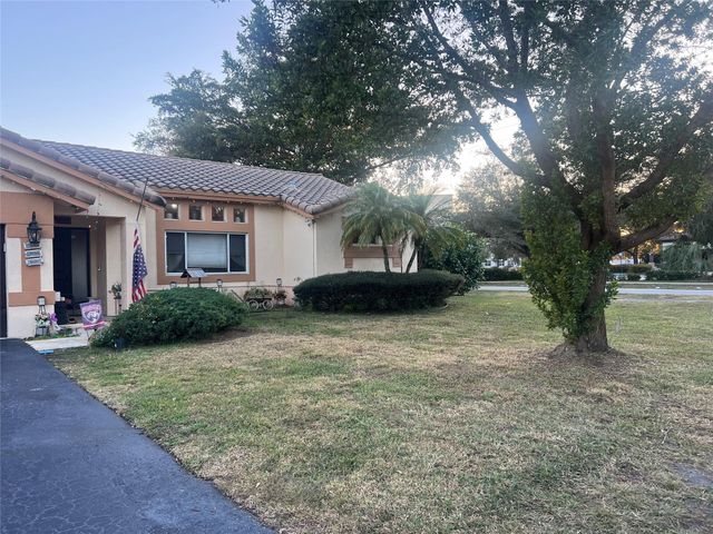 9876 NW 28th Court, Coral Springs, FL 33065