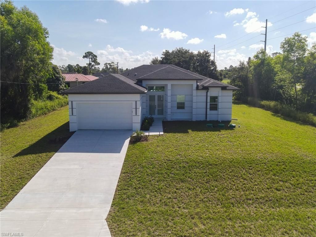 100 Denis AVE N, LEHIGH ACRES, FL 33971 — exterior