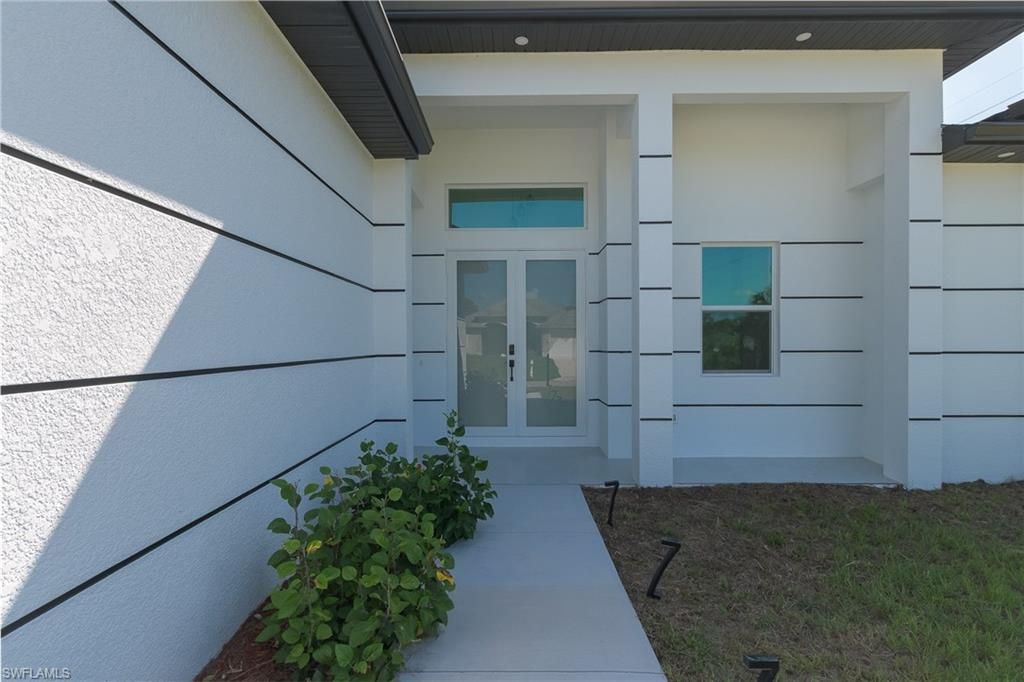 100 Denis AVE N, LEHIGH ACRES, FL 33971 — photo 4