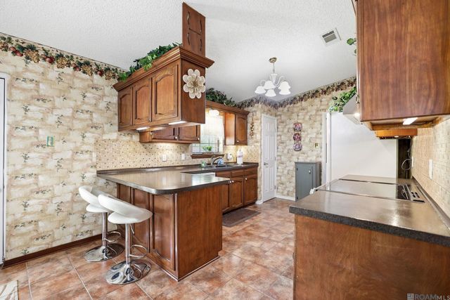 18029 Holly Ridge Dr, Hammond, LA 70403