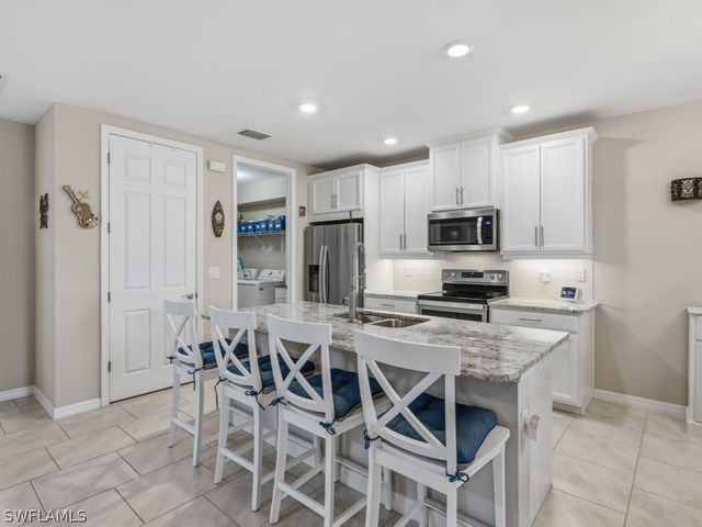 14591 Edgewater CIR, Naples, FL 34114