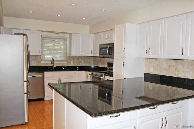 2734 S Heather Gardens Way, Aurora, CO 80014