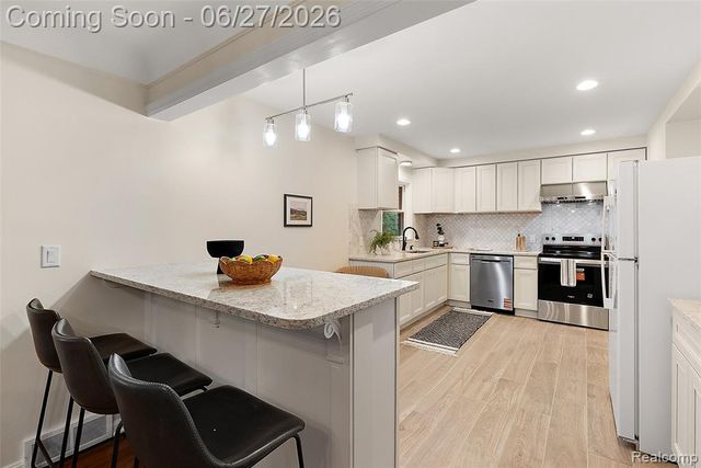 21235 River Road, Grosse Pointe Woods, MI 48236