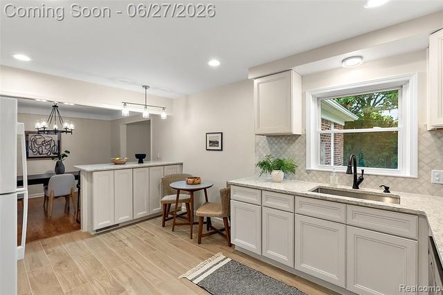 21235 River Road, Grosse Pointe Woods, MI 48236