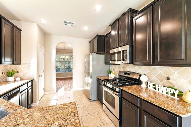 91 W Wading Pond Circle, The Woodlands, TX 77375