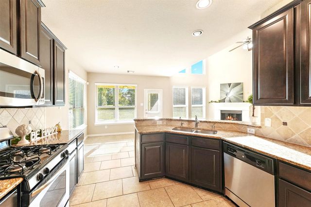 91 W Wading Pond Circle, The Woodlands, TX 77375