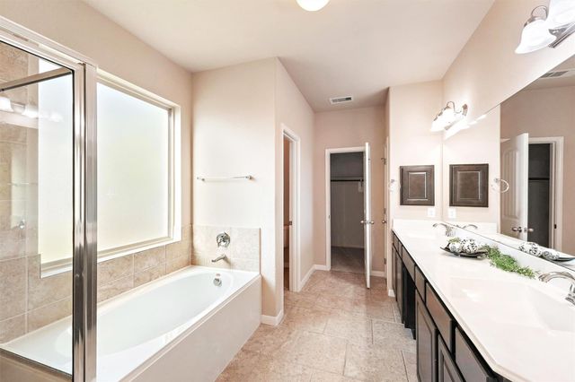 91 W Wading Pond Circle, The Woodlands, TX 77375