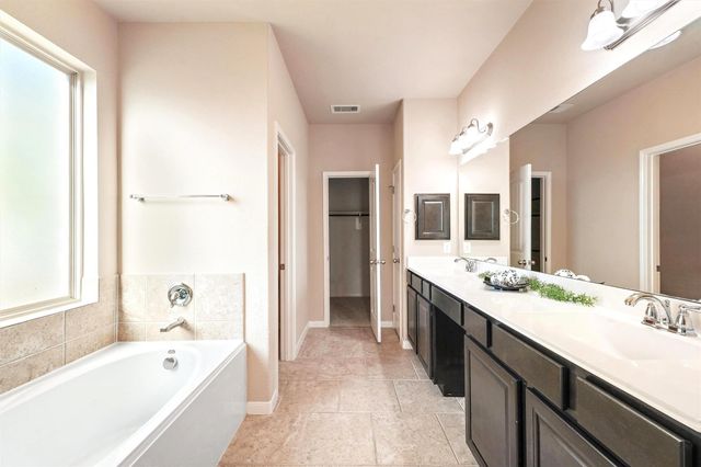 91 W Wading Pond Circle, The Woodlands, TX 77375