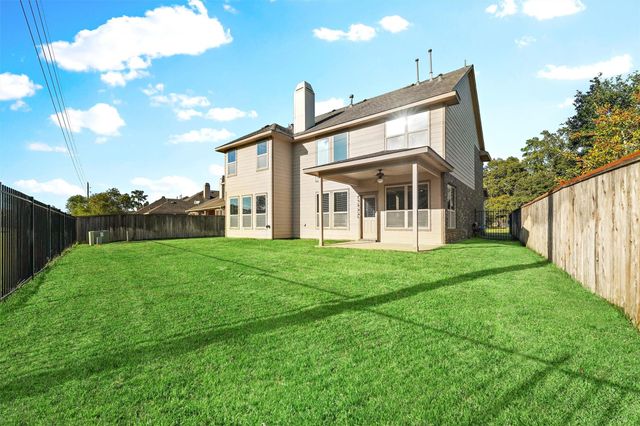 91 W Wading Pond Circle, The Woodlands, TX 77375