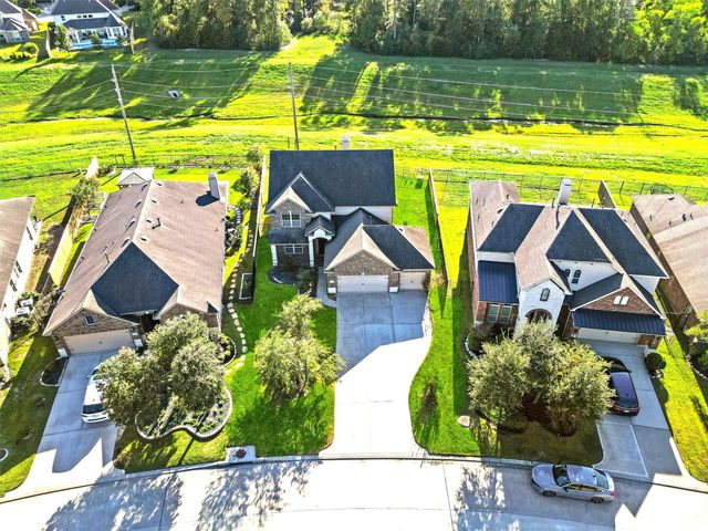 91 W Wading Pond Circle, The Woodlands, TX 77375