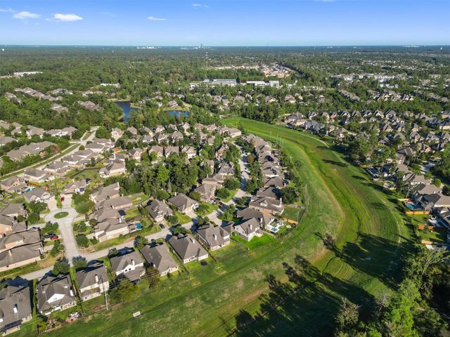 91 W Wading Pond Circle, The Woodlands, TX 77375