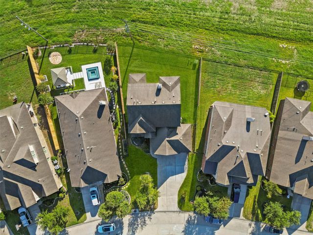 91 W Wading Pond Circle, The Woodlands, TX 77375
