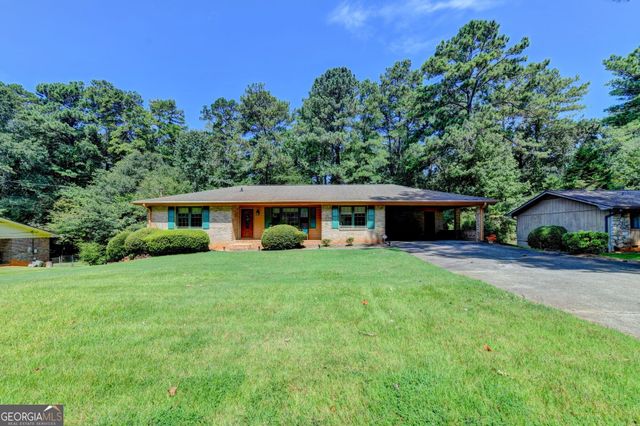 4061 Whispering Forest Court SW, Lilburn, GA 30047