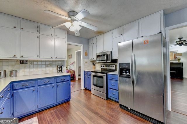 4061 Whispering Forest Court SW, Lilburn, GA 30047