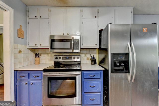 4061 Whispering Forest Court SW, Lilburn, GA 30047