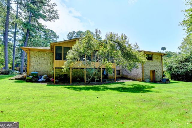 4061 Whispering Forest Court SW, Lilburn, GA 30047