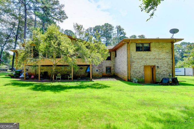 4061 Whispering Forest Court SW, Lilburn, GA 30047
