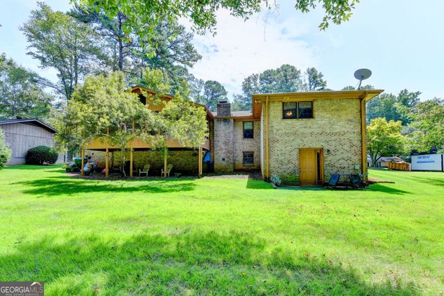4061 Whispering Forest Court SW, Lilburn, GA 30047