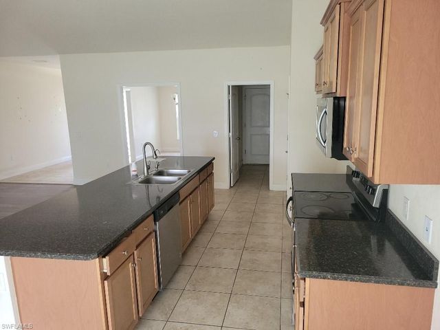 1852 Valmont ST, Lehigh Acres, FL 33972