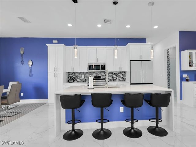 1020 Rush AVE, Lehigh Acres, FL 33972