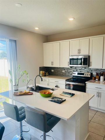 1120 SUGARWOOD STREET, Davenport, FL 33837