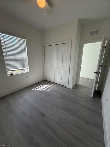 721 Ivan AVE S, Lehigh Acres, FL 33973