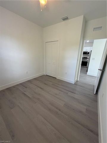 721 Ivan AVE S, Lehigh Acres, FL 33973