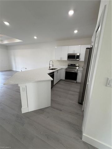 721 Ivan AVE S, Lehigh Acres, FL 33973