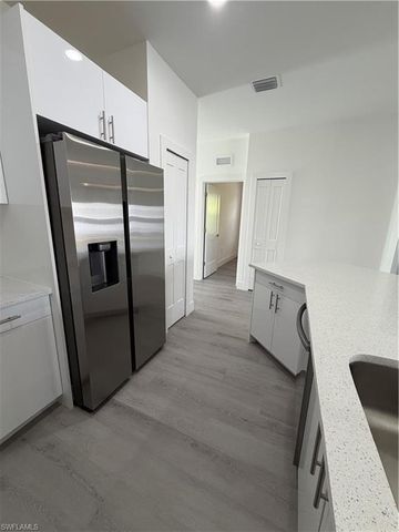 721 Ivan AVE S, Lehigh Acres, FL 33973