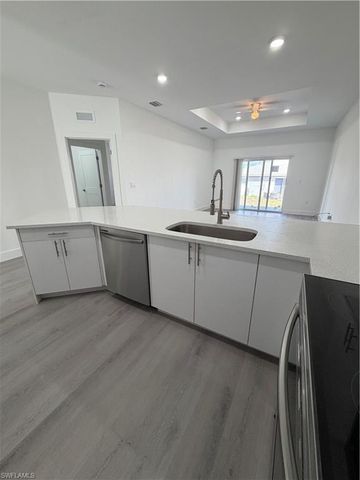 721 Ivan AVE S, Lehigh Acres, FL 33973